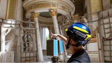 A UNESCO workers takes stock of historical monuments in Ukraine in a bid to document and preserve them.
